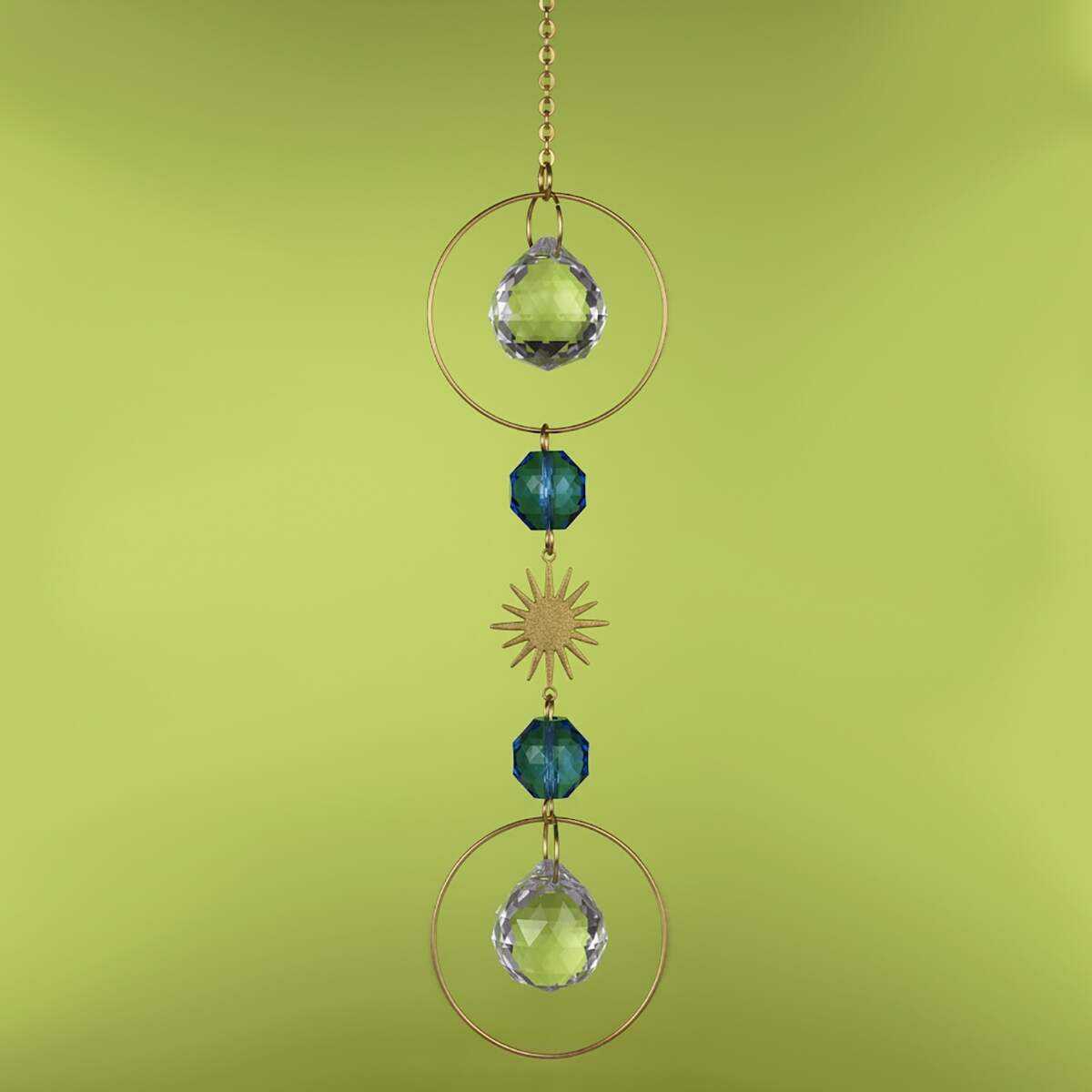 A blue crystal suncatcher with blue crystals, clear crystals and gold chain.