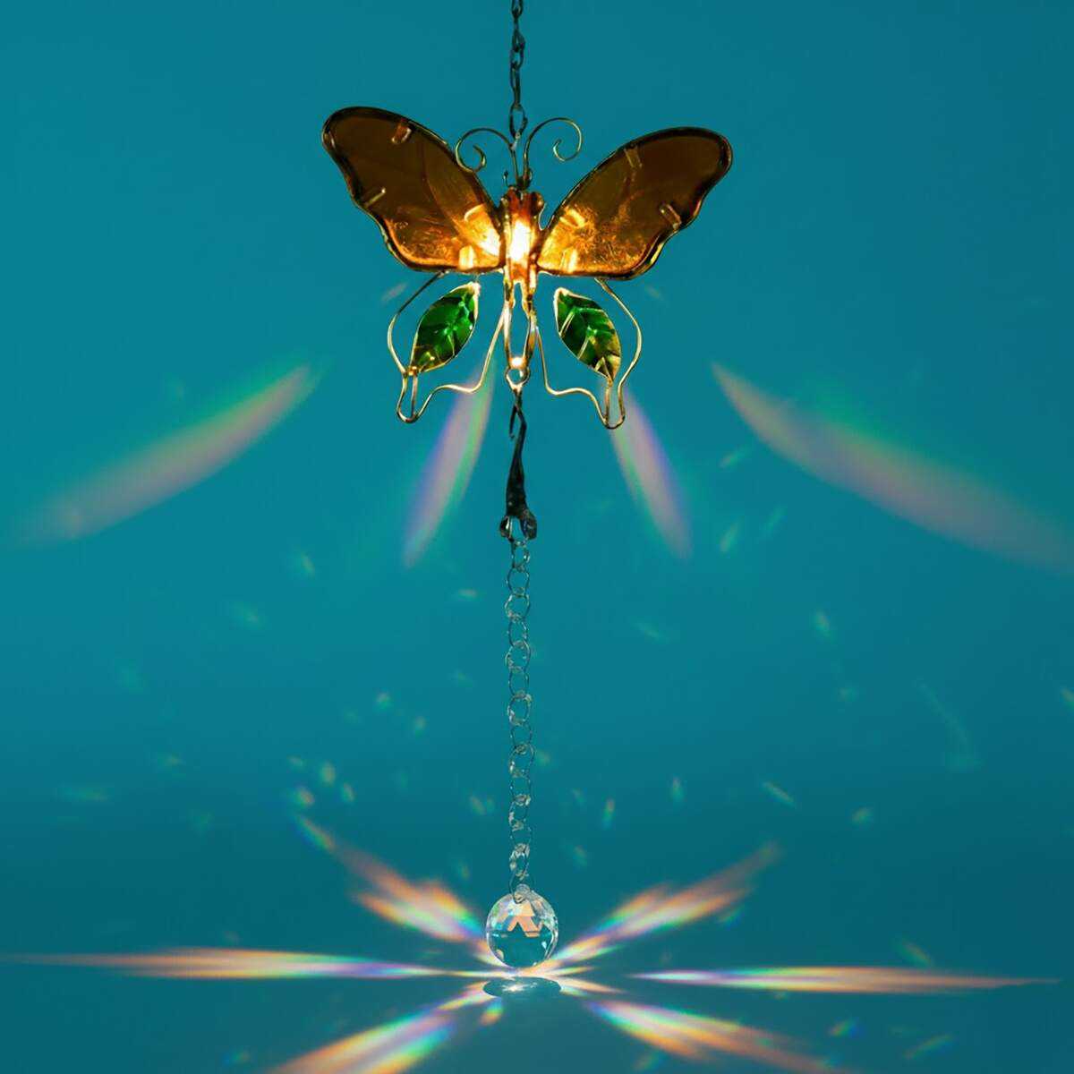 butterfly suncatcher on teal background