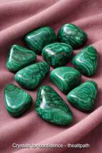 Malachite pebbles in mixed sizes used for crystals for self confidence and trust.