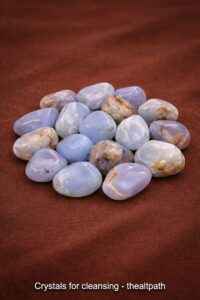 Tumbled chalcedony stones shown for the crystals for cleansing category.